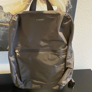 Tumi Nylon Backpack with Matching Pouch. Brand new, never used.